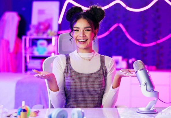 influencer-neon-and-portrait-of-girl-with-microph-2026-01-09-10-57-58-utc Influencer, neon and portrait of girl with microphone for podcast, live streaming and radio broadca.