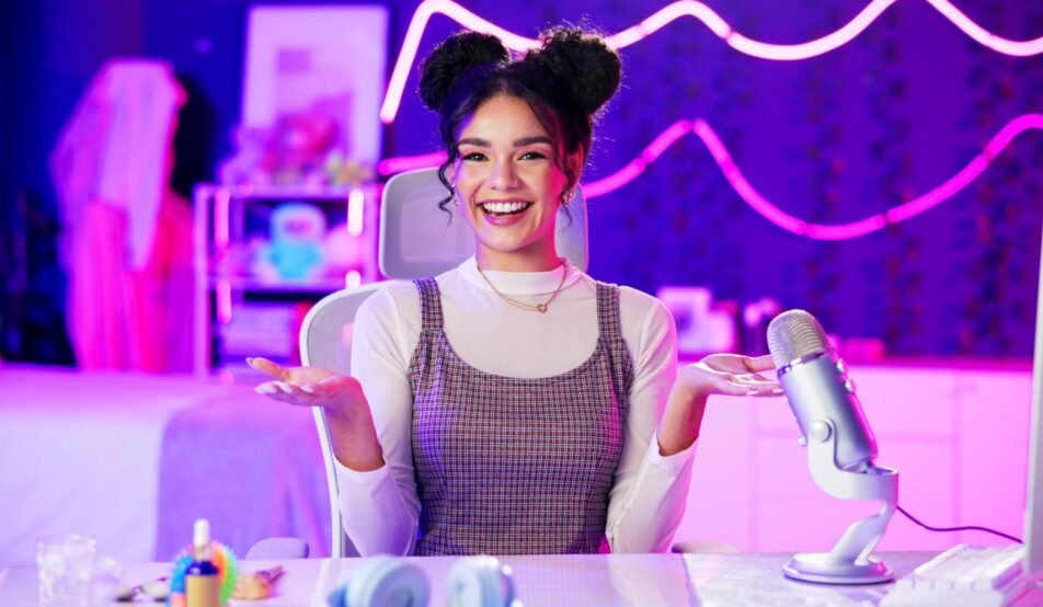 Influencer, neon and portrait of girl with microphone for podcast, live streaming and radio broadca.